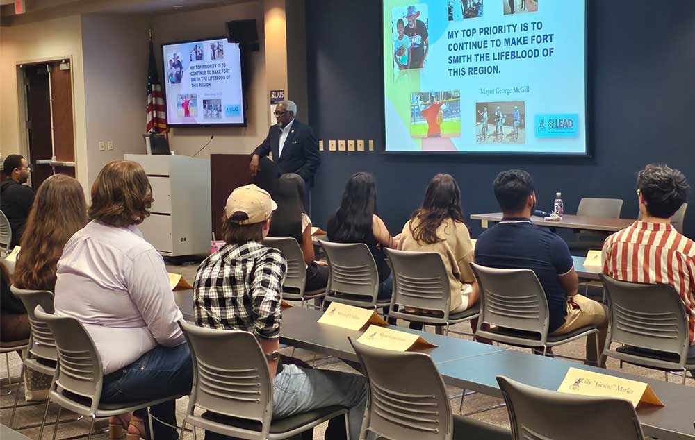 Mayor George McGill (center) speaks to LEAD LLC and Black Student Alliance students at recent Leadership Nuts and Bolts lecture