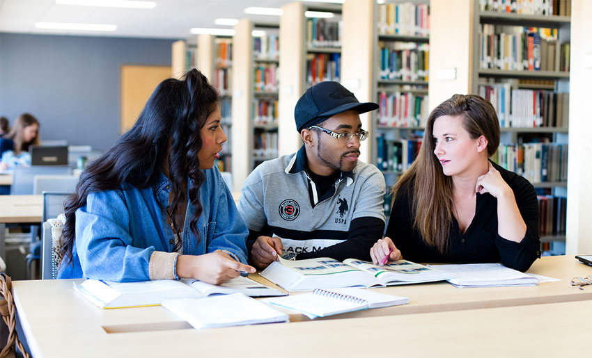 Students studying together at the Boreham Library at UAFS