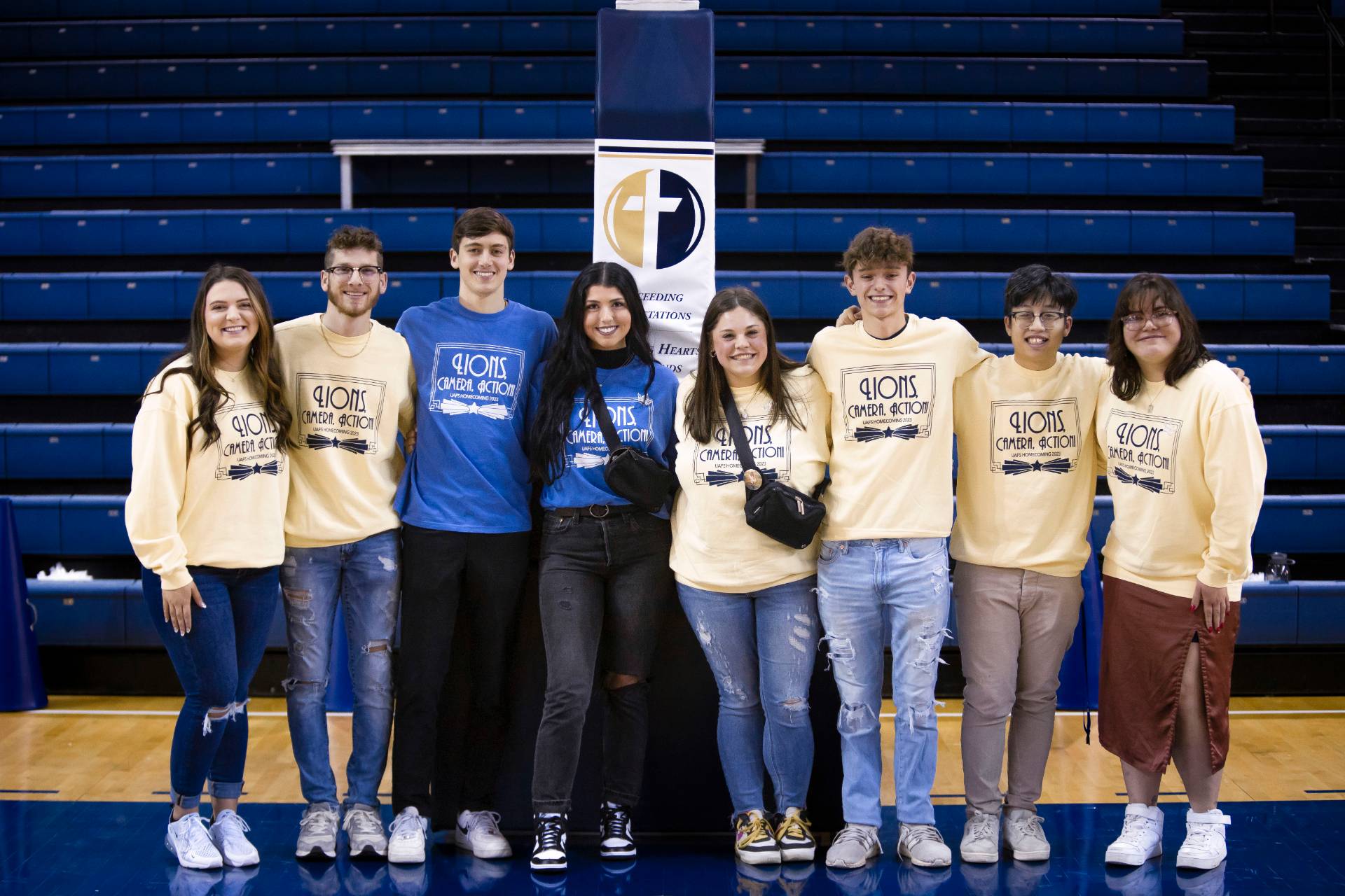 homecoming court winners stand in a line