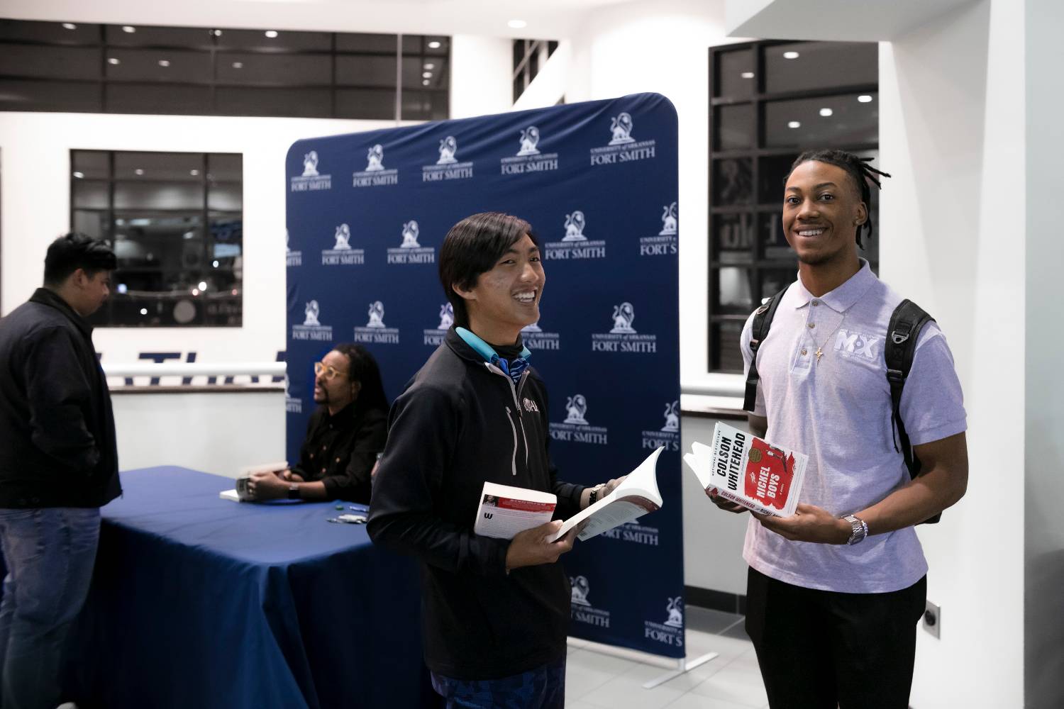 Students discuss their Colson Whitehead novels after getting them autographed