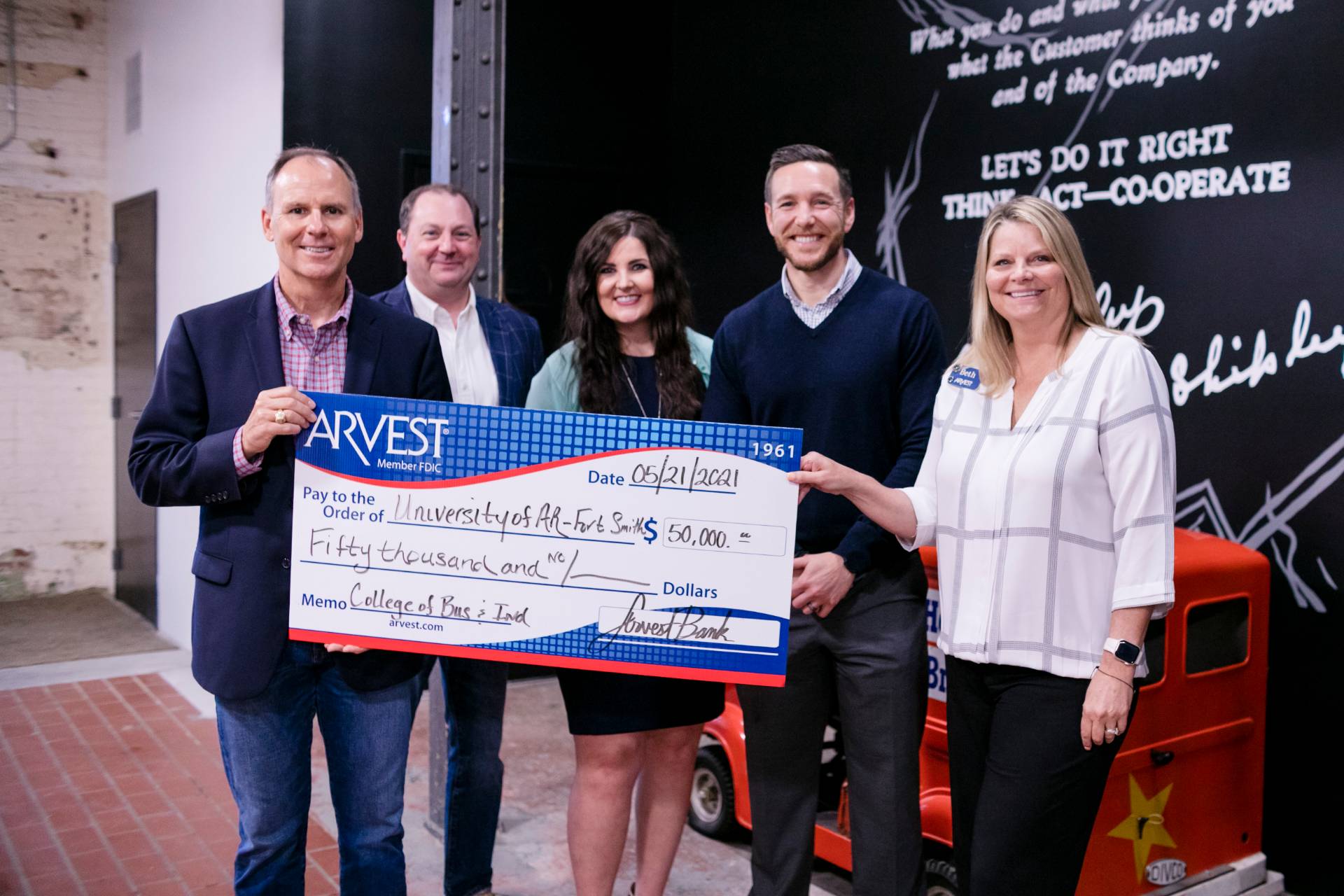 Arvest Representatives Pose at the New Bakery Location