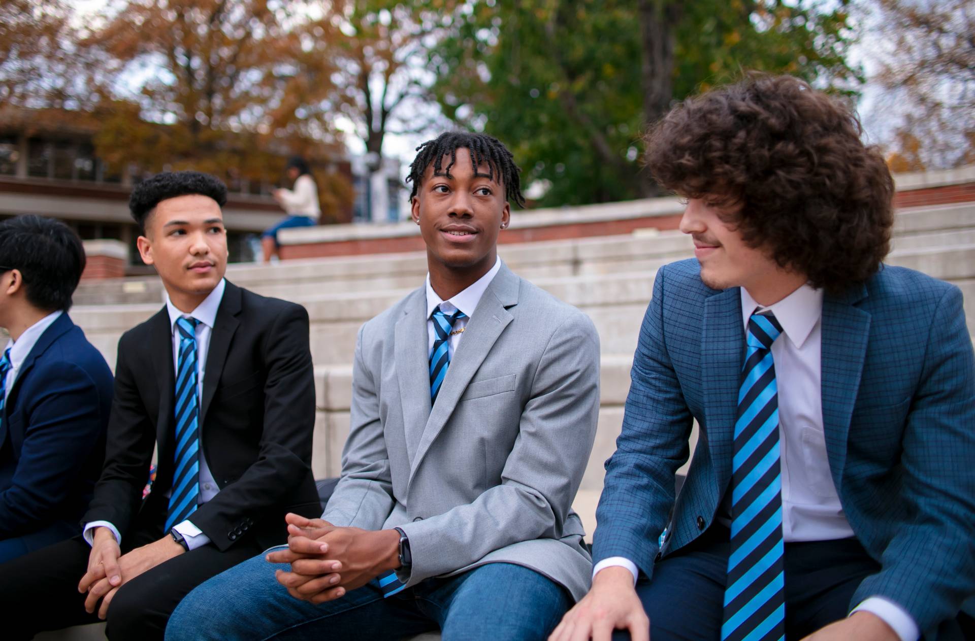 Johnathan Brewer, of the Men of Excellence program at UAFS sits with fellow members before a fall Men of Excellence meeting