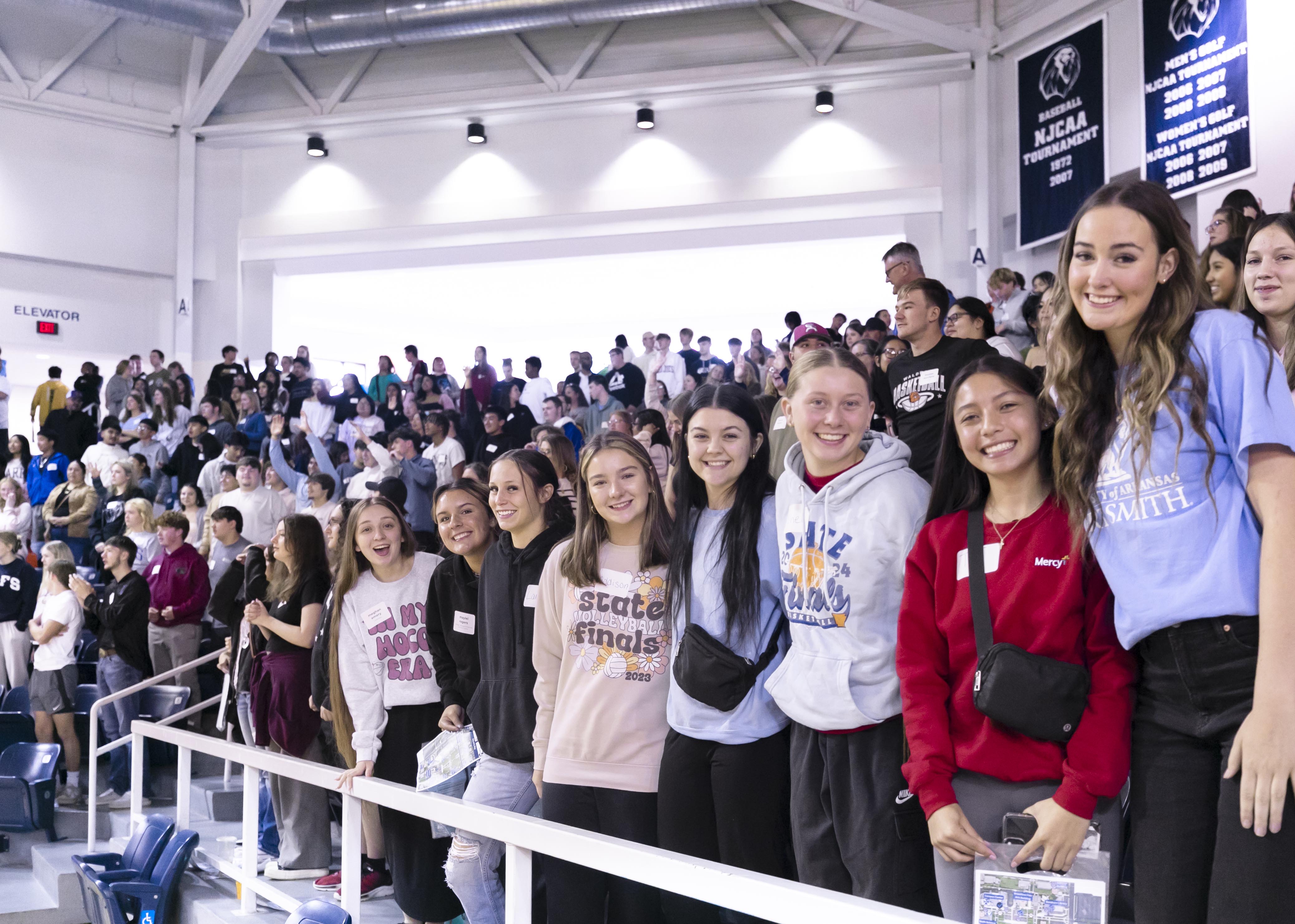 New students pose at an admissions event at UAFS