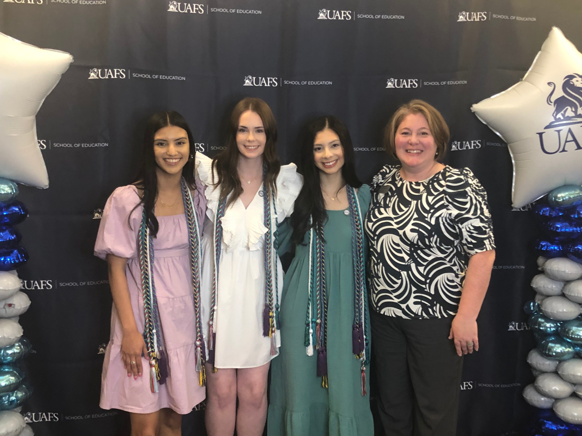 Spring 2022 Education Certificate Students and Susan Krafft on the right.