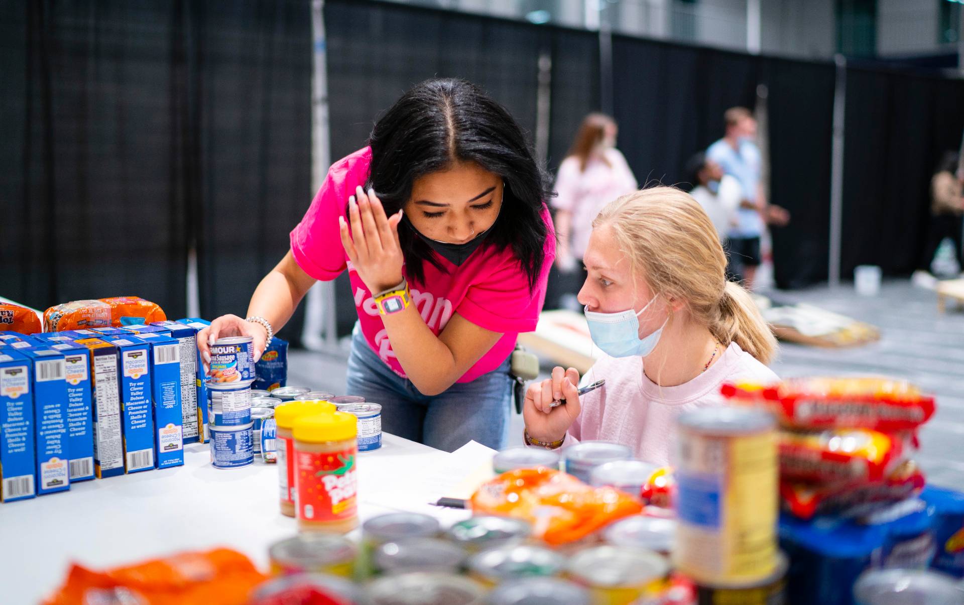 students count cans during a food drive